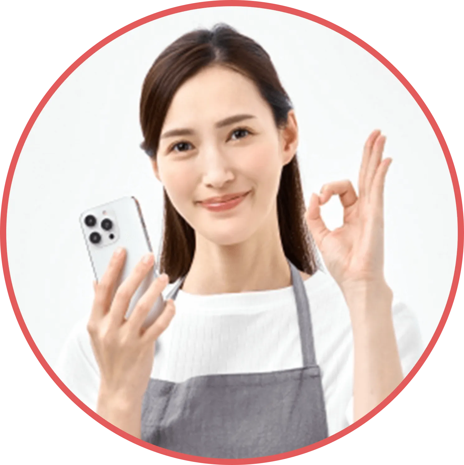 スマートフォンを手にする画像